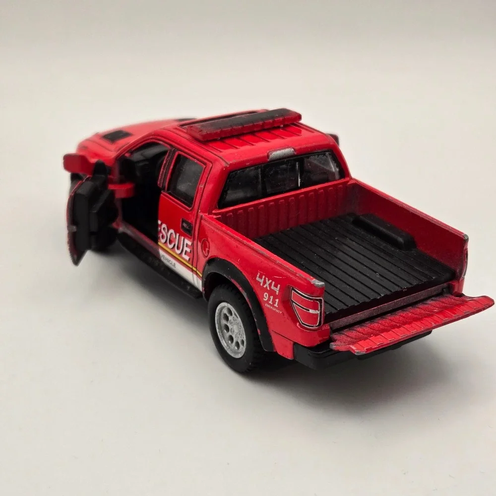 Kinsmart Kids Ford F-150 SVT Raptor Fire Rescue Truck Diecast Toy